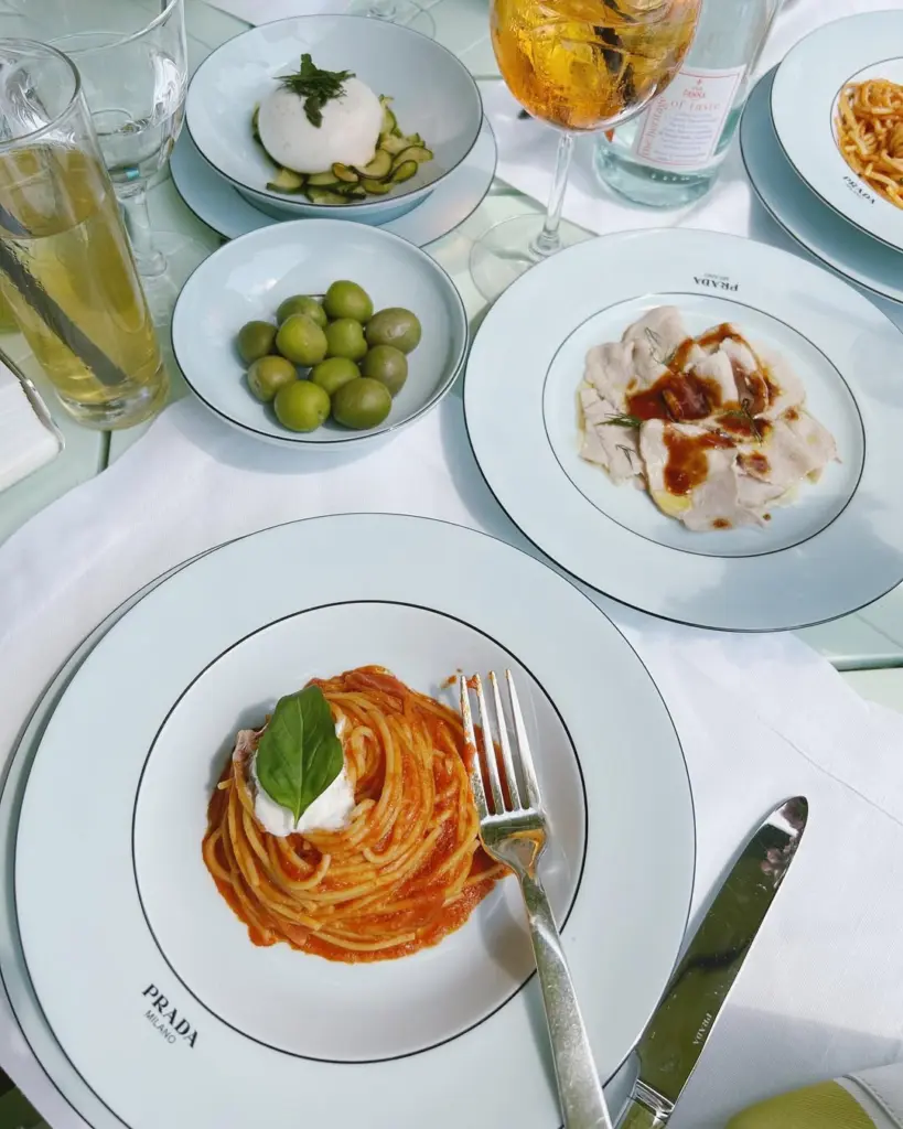 Prada Caffe meal spread